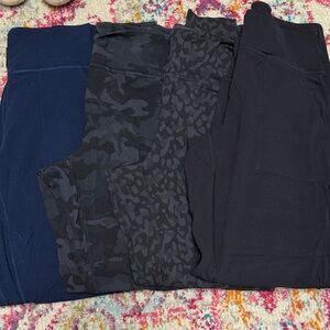 Lululemon Athletica Black, camo, gray leopard, and Navy Joggers Set 4 pair